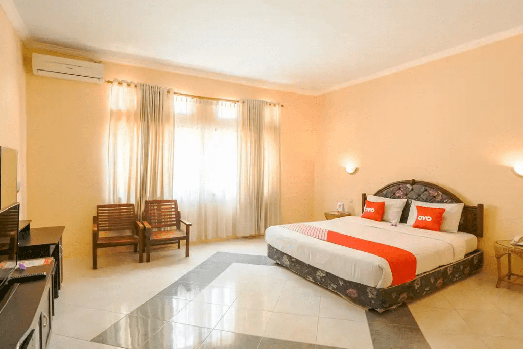 Kamar OYO 1732 Edotel Praya Syariah, sumber traveloka.com